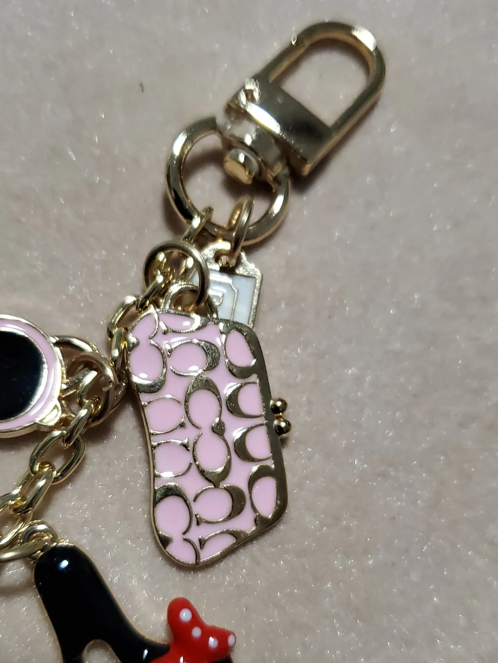 Source Unknown Gold-Tone Charm Keychain with Pink, Black & Red Accents